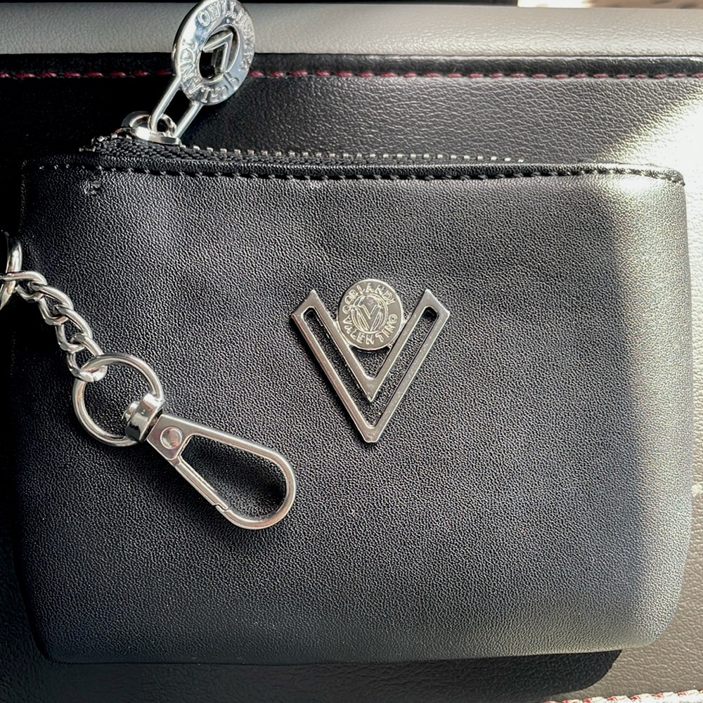 Italian brand Orlandi Valentino made an Italy, vegan leather wallet/coin purse